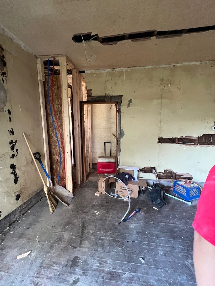 Interior renovation in progress, new framing and plumbing rough-in